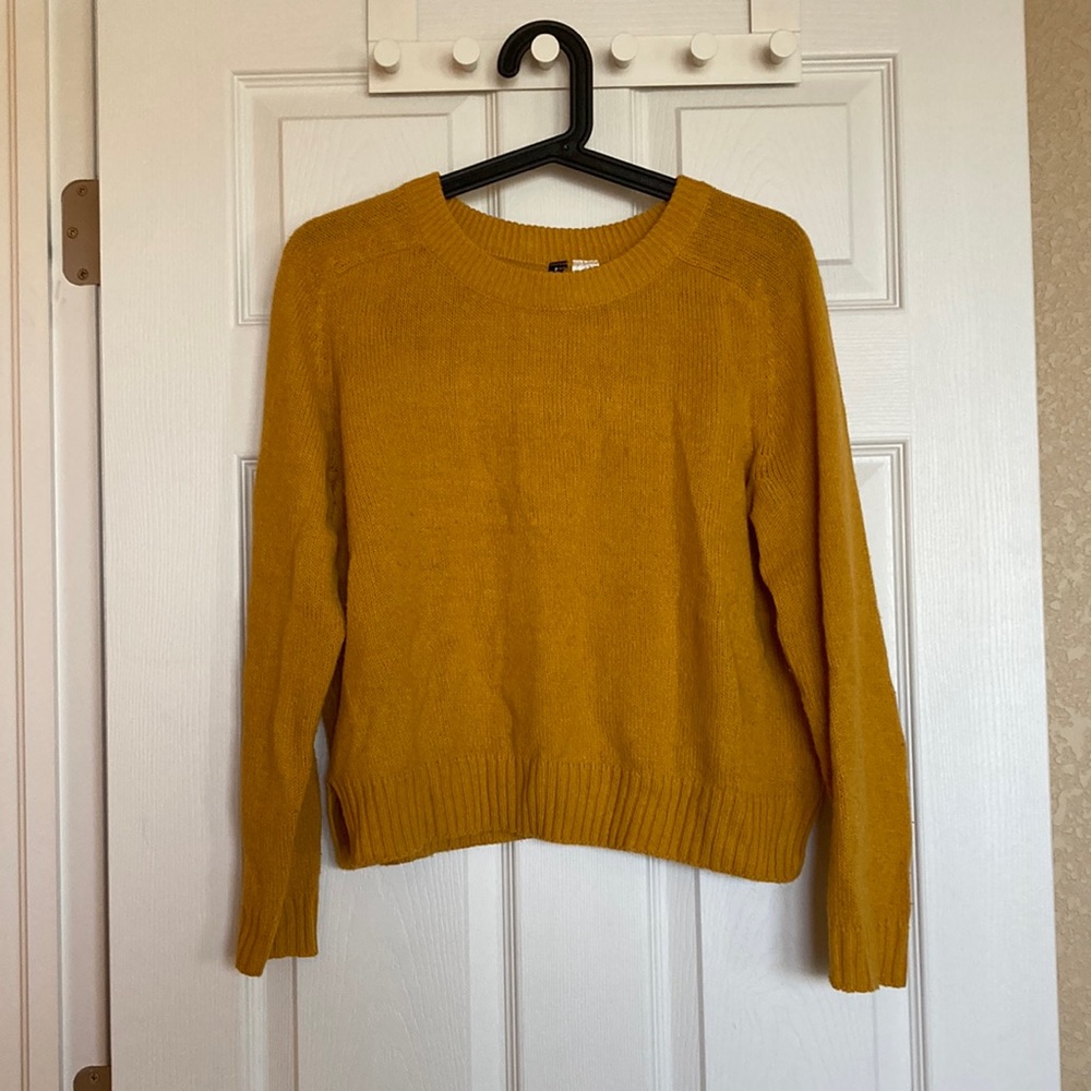 Yellow knitted sweater
